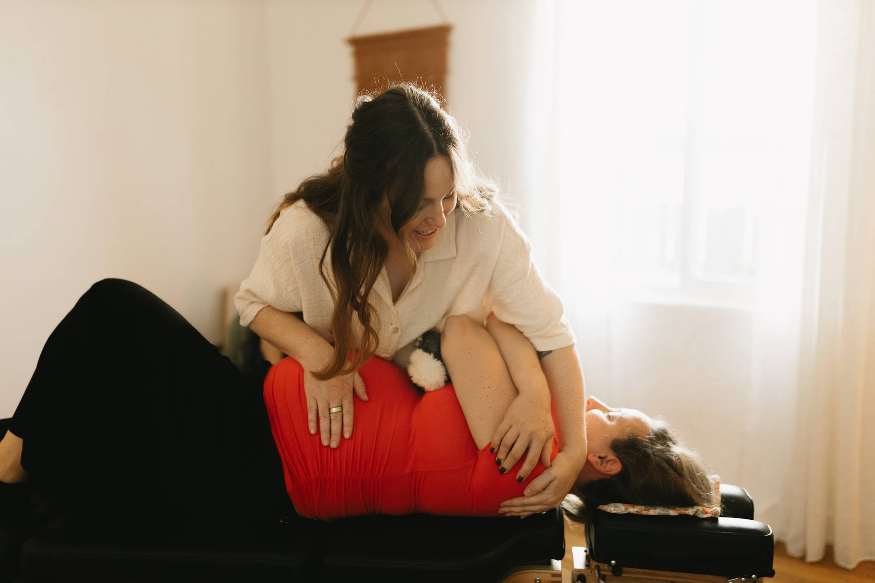 A patient receiving gentle chiropractic care at Sol Chiropractic